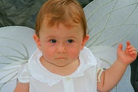 child with angel wings