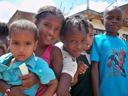 group photo of black kids on a sunny day