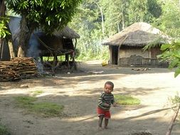 african child in tribal village, ethiopia