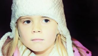 girl in white cap