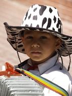 Cute child with hat on a head