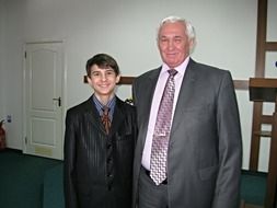 photos of father and son in suits