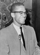 black and white photo of african american with microphone