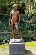 bronze statue of a young man