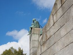 sculpture of a woman on the wall in Basel