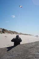 Child on the windy beach