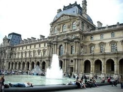 fountain near the louvre museum in paris