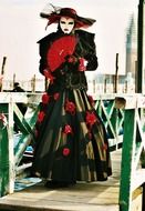 woman in a festive dress at the carnival