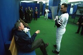 president george bush on a baseball game