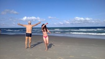 insanely beautiful people by beach
