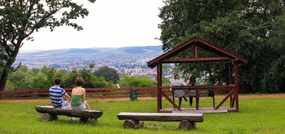 people in a picturesque park in a place to rest