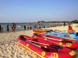 colorful inflatable boats on the beach