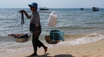 Woman seller on the beach in cambodia