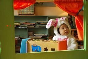 asian baby in bunny costume