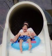 people having fun in aquapark