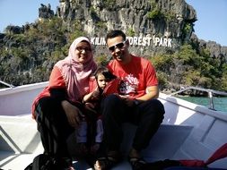 family travels by boat