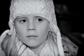 child in a winter knitted cap