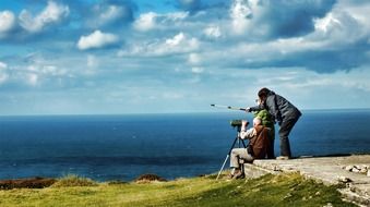 Looking far by binoculars