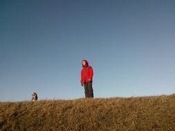 dog and man in red