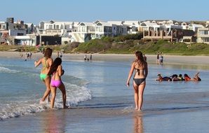 girls in a swimsuit on the beach