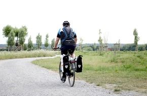 cyclist rides along the road