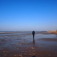 walk along the wide beach