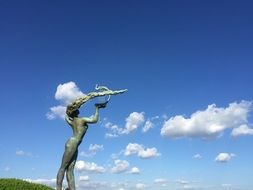 female sculpture at sky, china, Qingdao