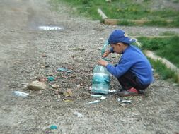 street children play plastic on the road