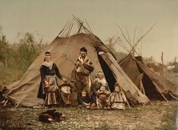 native american family near the tent