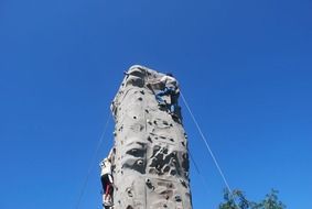 boys in training for rock climbing