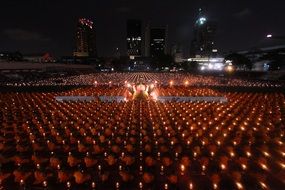 buddhists monks ceremony with lights