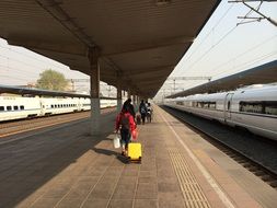 people at the train station