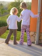 two little blond girls in the sunlight