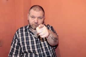 man with a gesture of conviction
