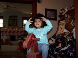 happy child on a wooden horse