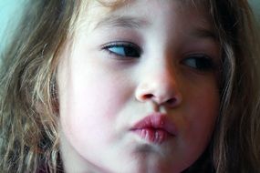photo of girl with outstretched lips