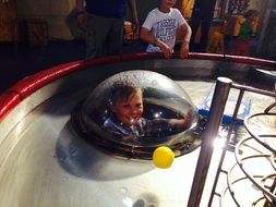 Playing child in amusement park