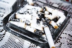 ashtray with cigarette butts