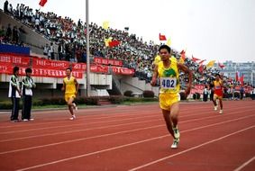 runners at the stadium