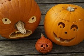 three pumpkins as attributes for halloween