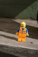 lego plastic orange man toy