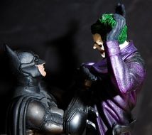 batman and joker cartoon figurine