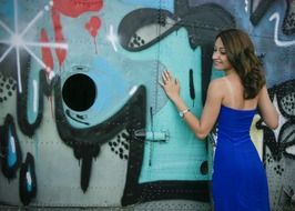 girl posing on the painted aircraft
