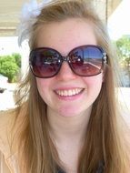 smiling beautiful girl in sunglasses