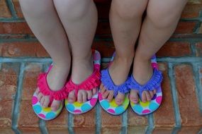 baby feet in summer slippers