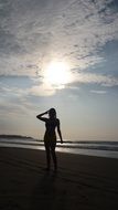 silhouette of a girl on the beach in ecuador