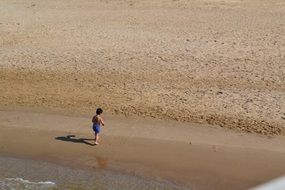 child on beach