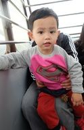 chinese baby in her arms