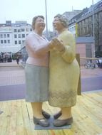 two senior women dancing together, germany, Alf Lechner Sculpture Park