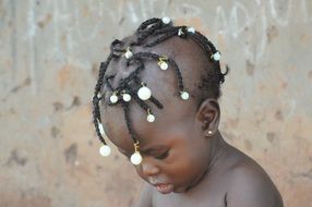 African child with pigtails